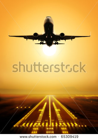 stock-photo-passenger-plane-fly-up-over-take-off-runway-from-airport-at-sunset-65309419.jpg